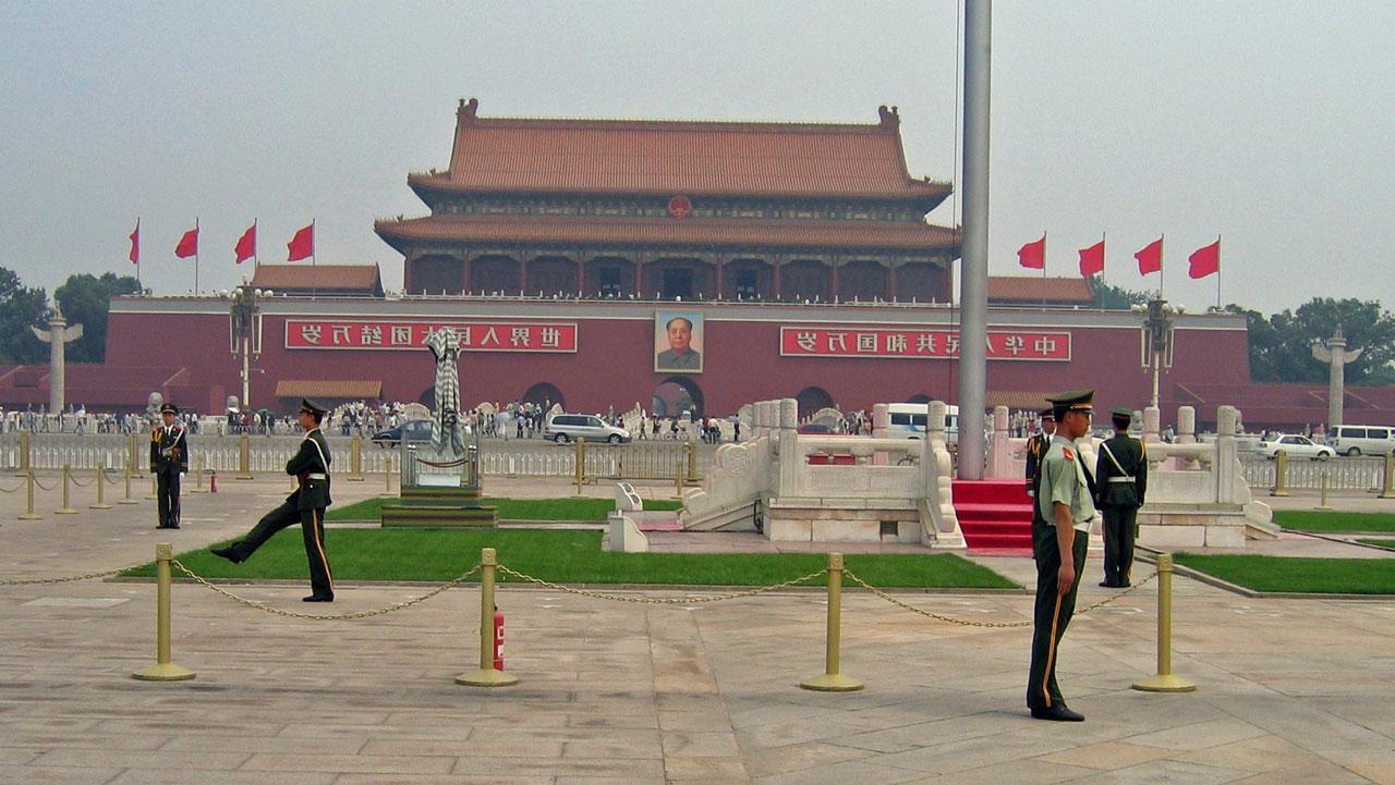 Building in China with guards in front.