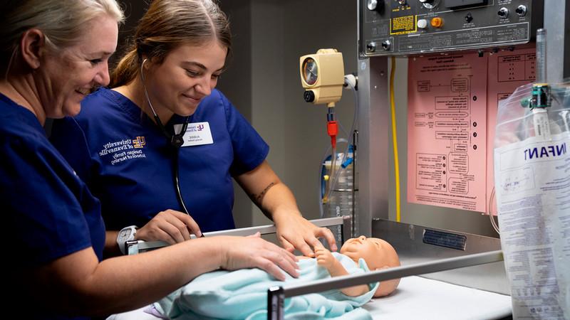 Aubrie with Katie Thomas in nursing lab